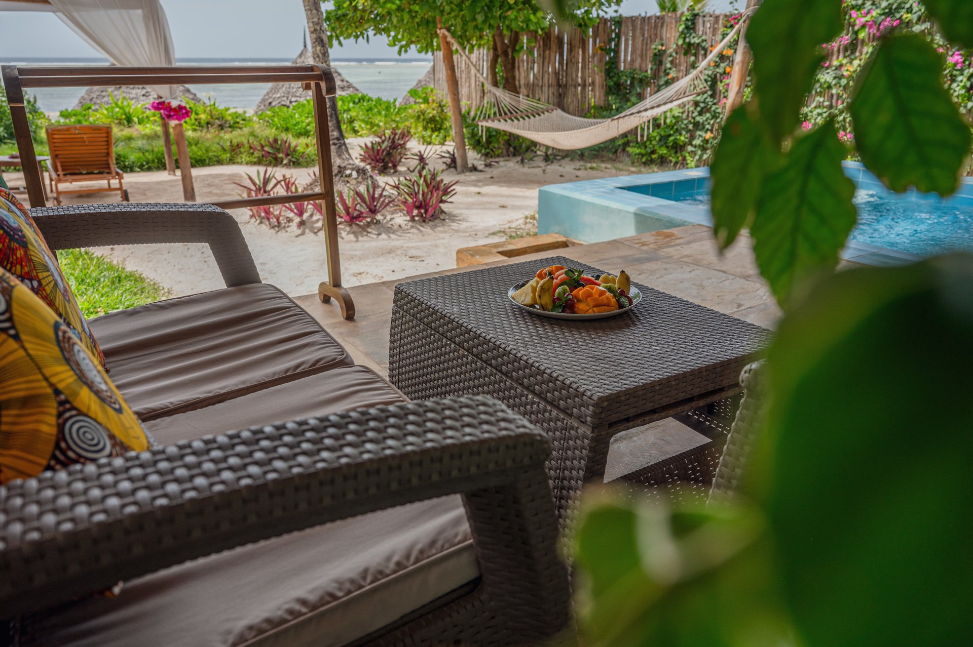 Sun loungers and a plunge pool steps from the sea